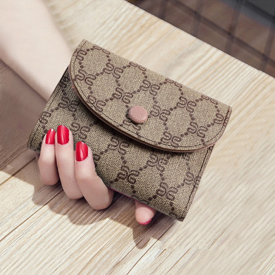 Modern kisméretű női pénztárca textilből és öko bőrből