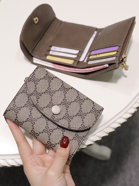 Modern kisméretű női pénztárca textilből és öko bőrből