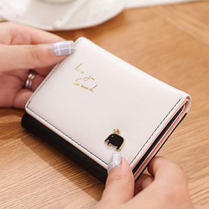 Väike nahast rahakott tikandi ja metallist kaunistusega - mitu mudelit