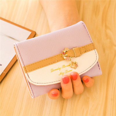 Väike nahast rahakott tikandi ja metallist kaunistusega - mitu mudelit