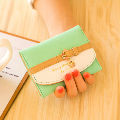 Väike nahast rahakott tikandi ja metallist kaunistusega - mitu mudelit