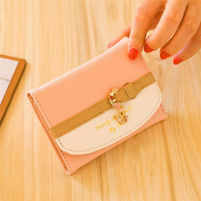 Väike nahast rahakott tikandi ja metallist kaunistusega - mitu mudelit