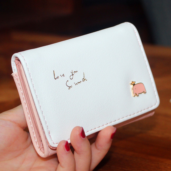 Väike nahast rahakott tikandi ja metallist kaunistusega - mitu mudelit