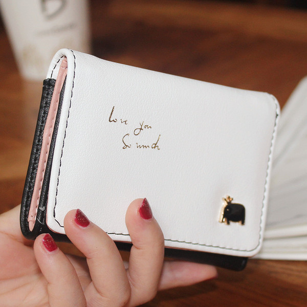 Väike nahast rahakott tikandi ja metallist kaunistusega - mitu mudelit