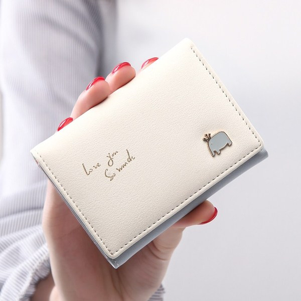 Väike nahast rahakott tikandi ja metallist kaunistusega - mitu mudelit