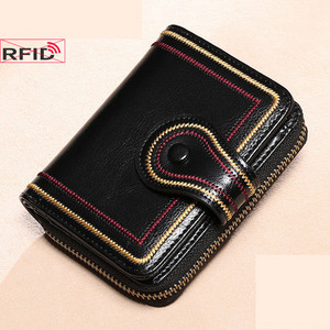 Модерен дамски портфейл с бродерия и джоб за монети