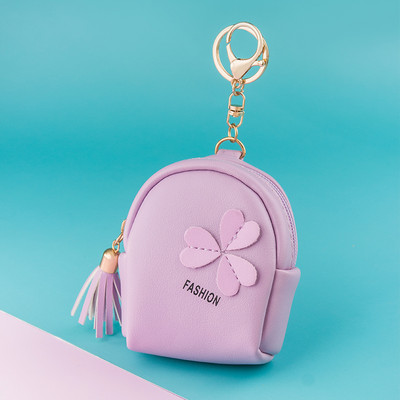 Γυναικείο έκο δερμάτινο πορτοφόλι με τρισδιάστατο στοιχείο και επιγραφή