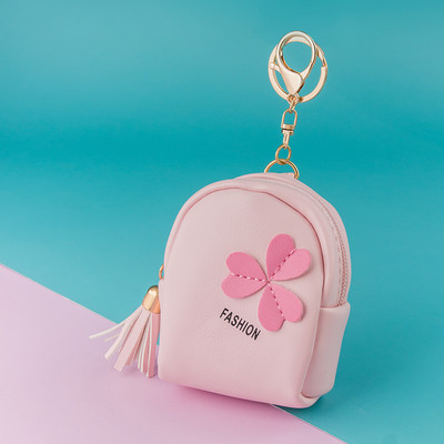 Γυναικείο έκο δερμάτινο πορτοφόλι με τρισδιάστατο στοιχείο και επιγραφή