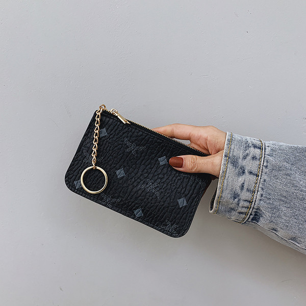 Novi model male kožne torbice za novčiće