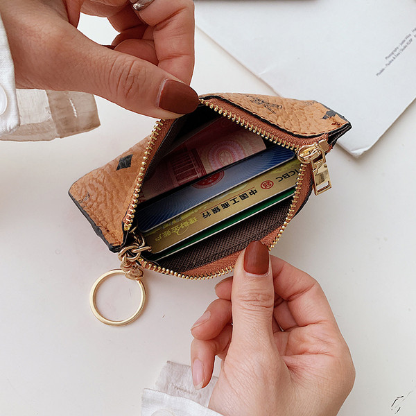 Novi model male kožne torbice za novčiće