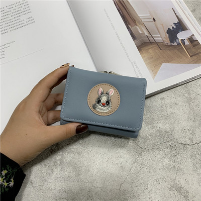 Γυναικείο καθημερινό πορτοφόλι με μεταλλική στερέωση και απλικέ