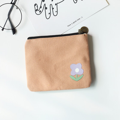 Väike tekstiilist rahakott värvirakendusega