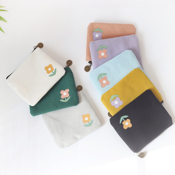 Väike tekstiilist rahakott värvirakendusega
