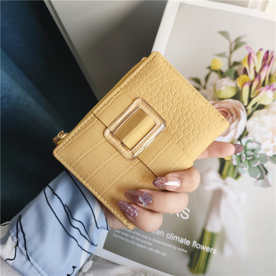 Νέο μοντέλο γυναικείο έκο δερμάτινο πορτοφόλι με μεταλλικό στοιχείο σε διάφορα χρώματα