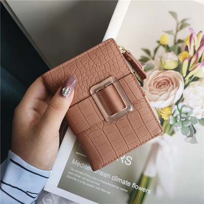 Νέο μοντέλο γυναικείο έκο δερμάτινο πορτοφόλι με μεταλλικό στοιχείο σε διάφορα χρώματα