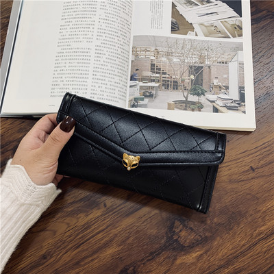 Πορτοφόλι με μεταλλική στερέωση σε μαύρο χρώμα