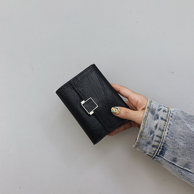 Γυναικείο μικρό έκο δερμάτινο πορτοφόλι με μεταλλική στερέωση