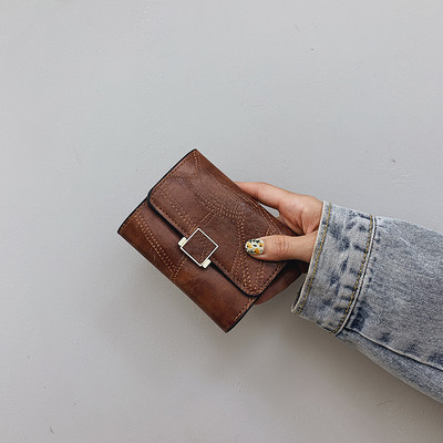 Γυναικείο μικρό έκο δερμάτινο πορτοφόλι με μεταλλική στερέωση