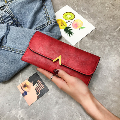 Naiste nahast rahakott metallist kaunistusega viies värvitoonis