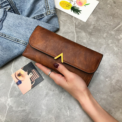 Naiste nahast rahakott metallist kaunistusega viies värvitoonis