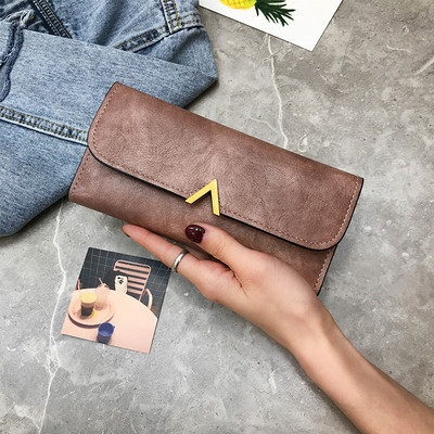 Naiste nahast rahakott metallist kaunistusega viies värvitoonis