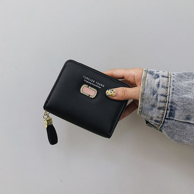 Γυναικείο πορτοφόλι με φούντα - οικολογικό δέρμα