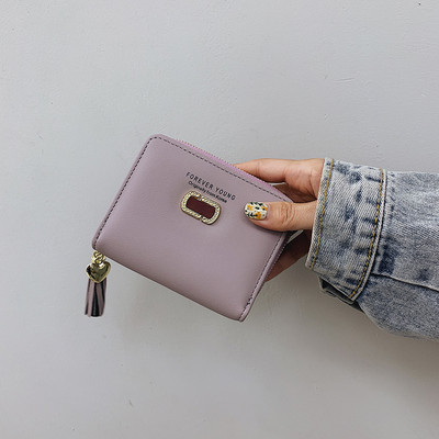 Γυναικείο πορτοφόλι με φούντα - οικολογικό δέρμα