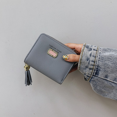 Γυναικείο πορτοφόλι με φούντα - οικολογικό δέρμα