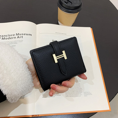 Eko bőrből készült stílusos női pénztárca többféle színben