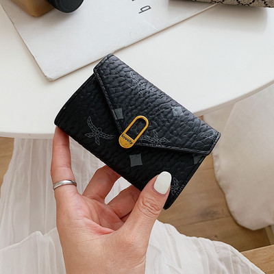 Νέο μοντνέλο γυναικείο έκο δερμάτινο πορτοφόλι με κούμπωμα