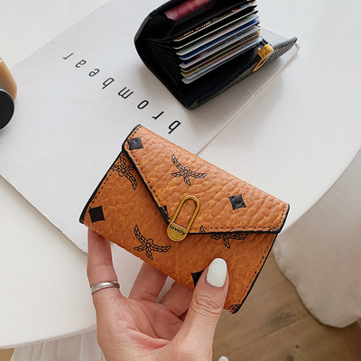 Νέο μοντνέλο γυναικείο έκο δερμάτινο πορτοφόλι με κούμπωμα