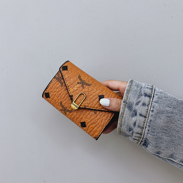 Νέο μοντνέλο γυναικείο έκο δερμάτινο πορτοφόλι με κούμπωμα