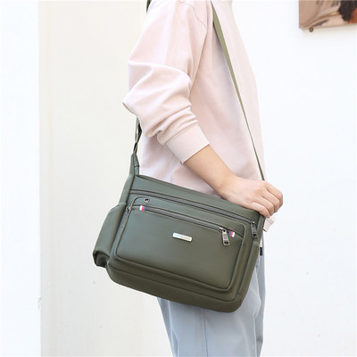 Meeste tekstiilist kott luku ja pika sangaga