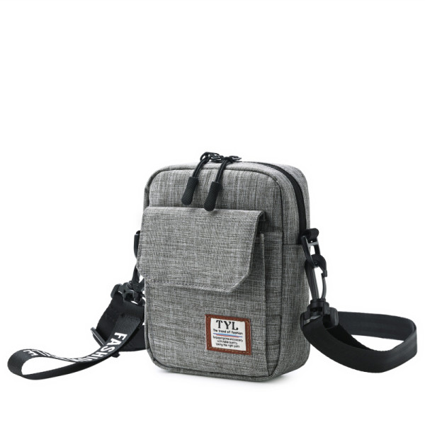 Férfi táska hosszú füllel és elülső zsebbel