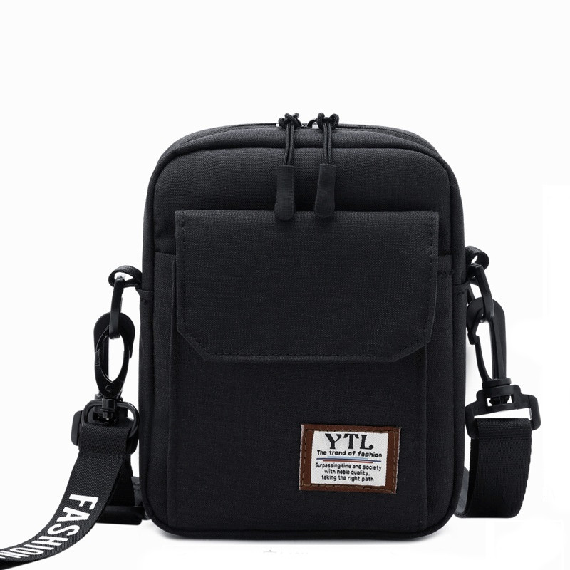 Férfi táska hosszú füllel és elülső zsebbel