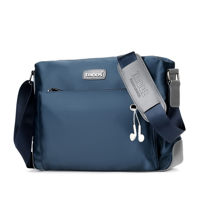 Ежедневна мъжка текстилна чанта в син и черен цвят 