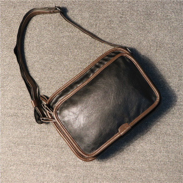 Pehmest nahast musta värvi vabaaja meeste kott