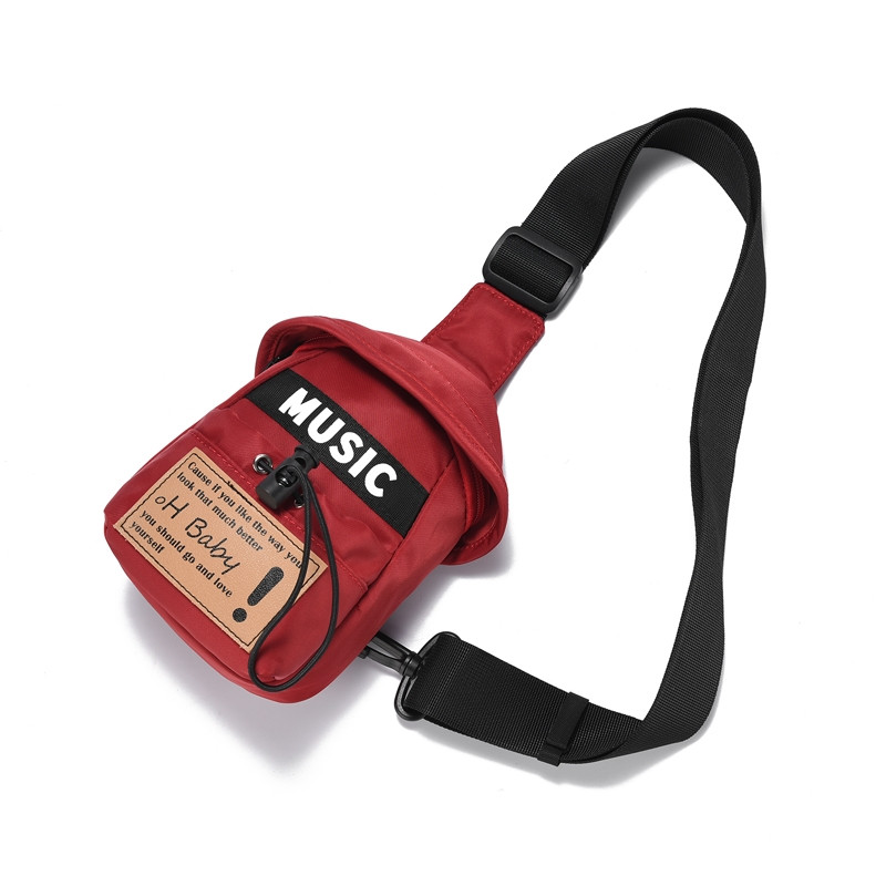 Kolmes värvitoonis kirjaga ja pika sangaga igapäevane meestekott