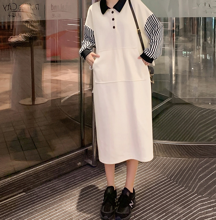 Női alkalmi ruha széles modell gombokkal és klasszikus gallérral