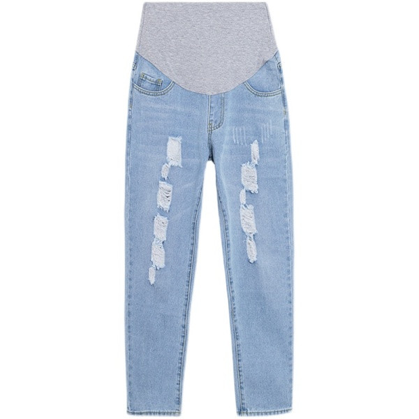 Šiuolaikiški džinsai su plėšytais motyvais