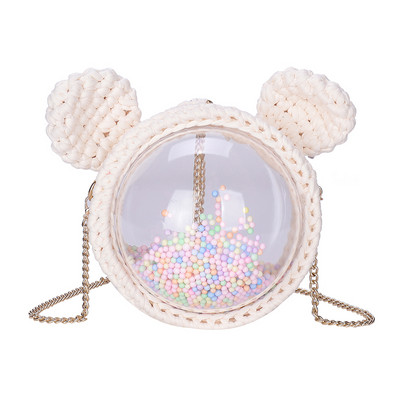 Naiste ümmargune kott 3D elemendi ja metallist sangaga