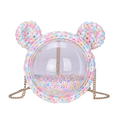 Naiste ümmargune kott 3D elemendi ja metallist sangaga