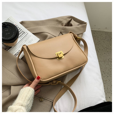 Ženska svakodnevna kožna torba s metalnim kopčanjem