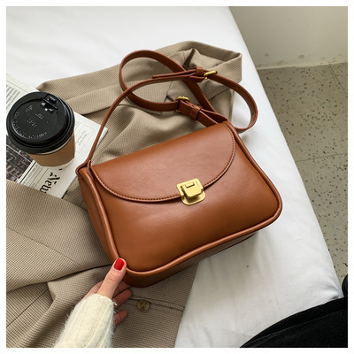 Ženska svakodnevna kožna torba s metalnim kopčanjem