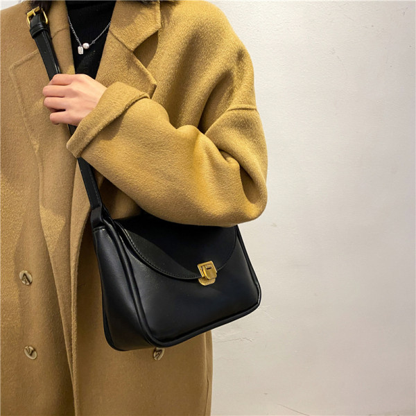 Ženska svakodnevna kožna torba s metalnim kopčanjem