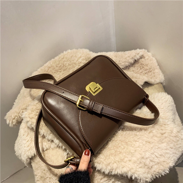 Ženska svakodnevna kožna torba s metalnim kopčanjem