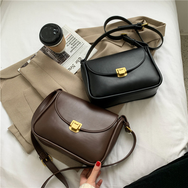 Ženska svakodnevna kožna torba s metalnim kopčanjem