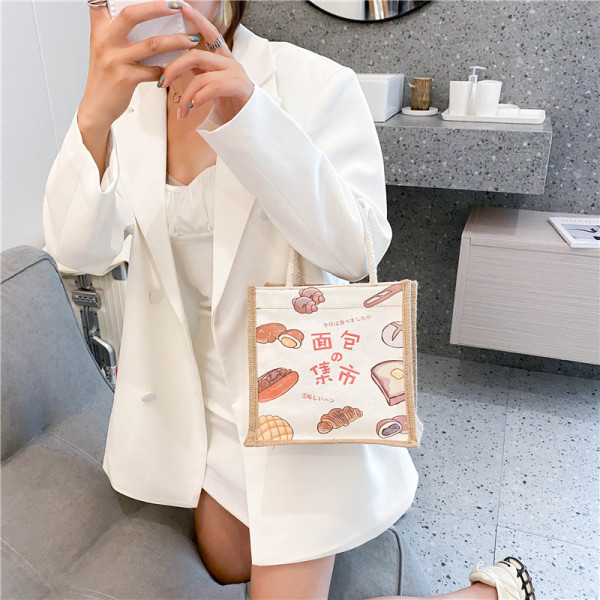 Női alkalmi táska színes mintával, rövid füllel