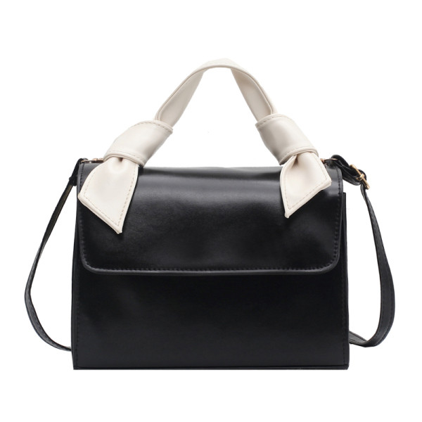 Κομψή γυναικεία τσάντα με δύο λαβές σε διαφορετικά χρώματα