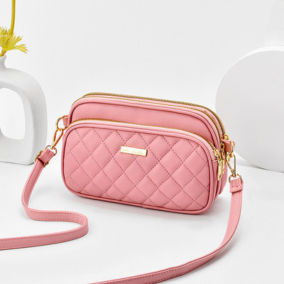 Eko bőrből készült alkalmi női táska cipzárral és hosszú füllel